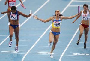 women celebrating relay